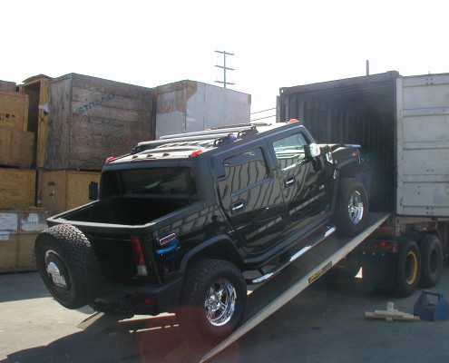 Vehicle loading into container