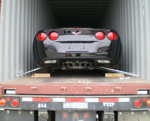 Vehicle strapped, braced and blocked securely inside container